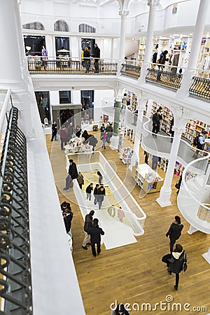 Tourists and local people seeking books in Carturesti Library Editorial Stock Photo