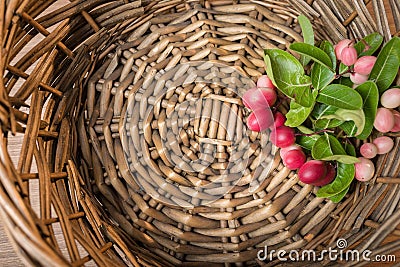 Carunda, Karonda fruite in rattan tray. Stock Photo