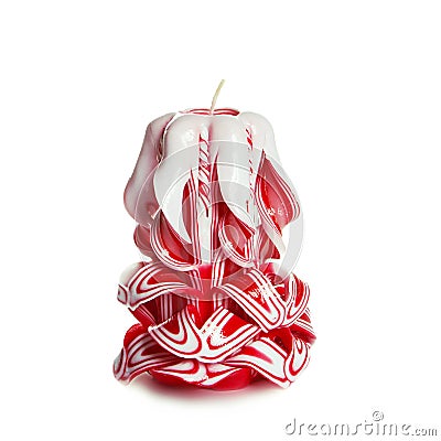 Carved colored candle on white background Stock Photo