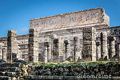 Carved columns at Mayan ruins of Temple of the Warriors in Chichen Itza - Yucatan, Mexico Stock Photo