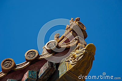 Carved cornerpiece of traditional chinese roof Stock Photo