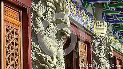 Carved dragons on po lin monastery in hong kong Stock Photo