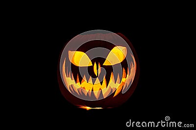 Carved halloween pumpkin with candle Stock Photo