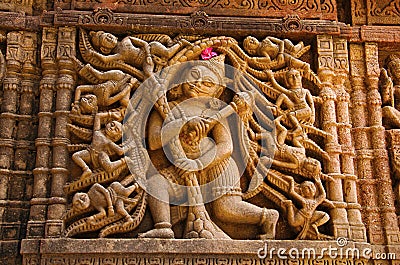 Carved idol on the outer wall, Hatkeshwar Mahadev, 17th century temple, the family deity of Nagar Brahmins. Vadnagar, Gujarat Stock Photo