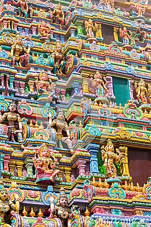 Carved images on the gopura tower of the Sri Maha Mariamman Temple, a Tamil Hindi temple located in Silom road, Bangkok, Stock Photo