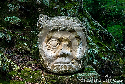 Carved old man head at Mayan Ruins - Copan Archaeological Site, Honduras Editorial Stock Photo