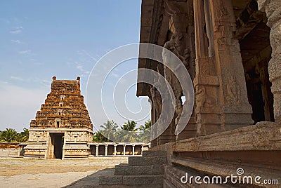 Carved Pillars of Kalyana Mandapa, Divine Marriage Hall, and Gopuram on the East. Pattabhirama Temple, Hampi, Karnataka. View from Stock Photo