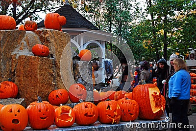 Carved pumpkins in a park Editorial Stock Photo