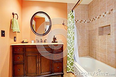 Carved wood bathroom vanity cabinet with mirror Stock Photo