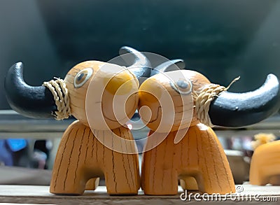 Carved wood buffalo loved by each other Stock Photo