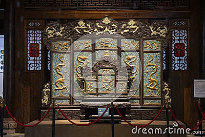 The carved wooden dragon throne. It's the throne of the Emperor of China Editorial Stock Photo