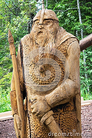 Carved wooden figure. Stock Photo
