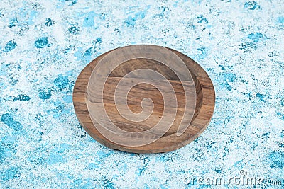 Carved wooden platters with pieces on them Stock Photo