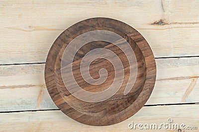 Carved wooden platters with pieces on them Stock Photo