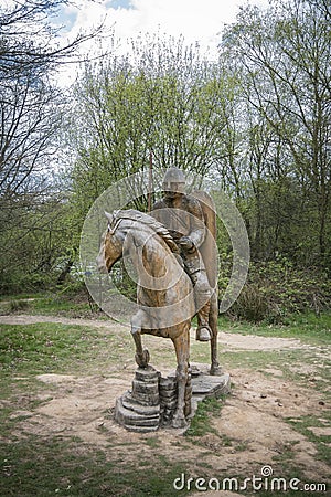 Carved Wooden Soldier and Horse Editorial Stock Photo