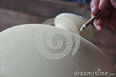 Carving picture and pattern on Porcelain vase - Jingdezhen - Jiangxi Province - China Stock Photo