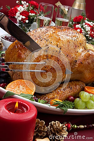 Carving Roasted Turkey for Christmas Dinner Stock Photo