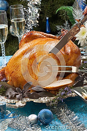 Carving Roasted Turkey for White Christmas Stock Photo