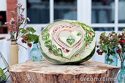 Carving watermelon. Decoration fresh fruit. Design Stock Photo