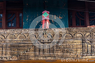 Carvings on the rustic surface of an old vintage Portuguese era house in Fontainhas in the city Editorial Stock Photo