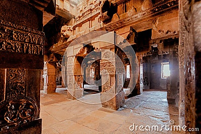 Carvings on walls of the Hindu temple, India. 7th century architecture in Pattadakal with decorations on stone reliefs Stock Photo