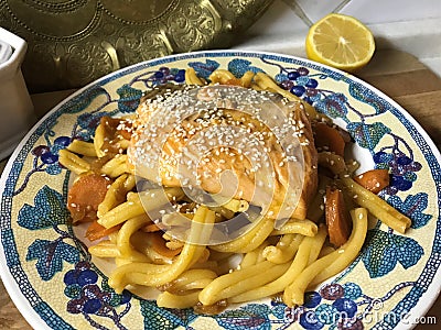 Casarecce pasta with trout in orange marinade. Stock Photo