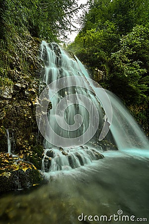 Cascada Urlatoarea Busteni Urlatoarea waterfall Howling in Bucegi mountains, Romania near to Sinaia. Nature wonder in the Stock Photo