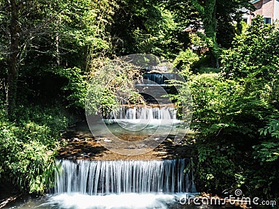 Cascading waterfall in the Suzu River near the Oyama Cable Car to Afuri Shrine, Isehara, Japan Stock Photo