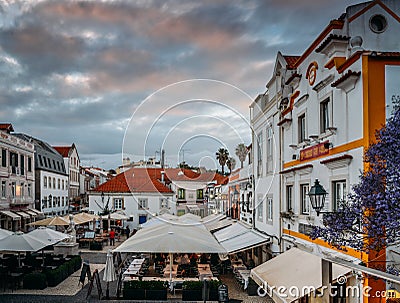 Busy touristic restaurants and bars area in the center of Cascais with traditional Portuguese architecture Editorial Stock Photo