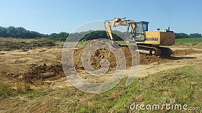 case excavator at a construction site Editorial Stock Photo