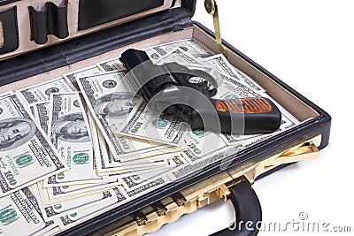 Case with money and gun Stock Photo