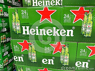 Cases of Heineken Bottle Beer at a grocery store waiting for customers to purchase Editorial Stock Photo