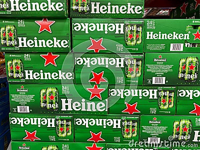 Cases of Heineken Bottle Beer at a grocery store waiting for customers to purchase Editorial Stock Photo