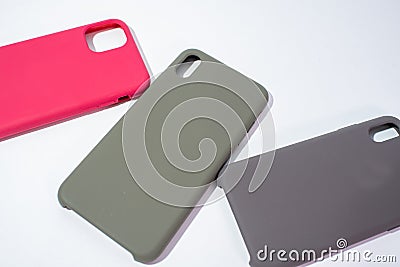 Cases for smartphones in different colors on a white background. Stock Photo
