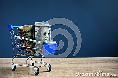 Cash for loan in the shopping cart. Lending money Stock Photo