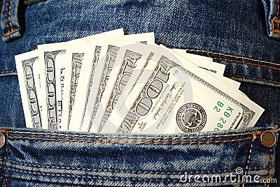 Cash, money is in the pocket of blue jeans Stock Photo