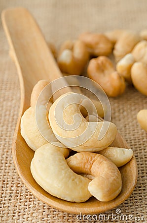 Cashew nuts in wooden spoon Stock Photo