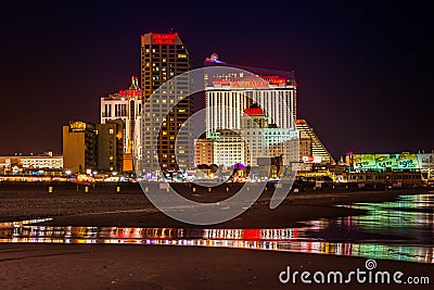 Casinos and the beach at night in Atlantic City, New Jersey. Editorial Stock Photo