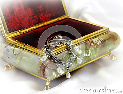 Casket from onyx in a gold frame Stock Photo