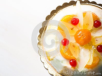 Cassata siciliana on white wooden table Stock Photo