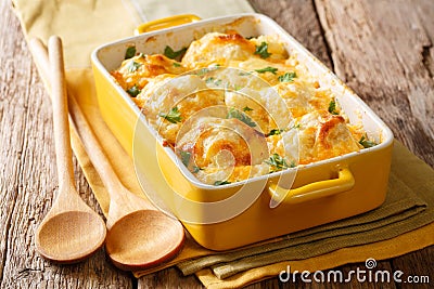 casserole from cauliflower with bechamel sauce close-up in a baking dish. horizontal Stock Photo