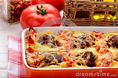 Casserole with vegetables, meatballs and cheese. Stock Photo