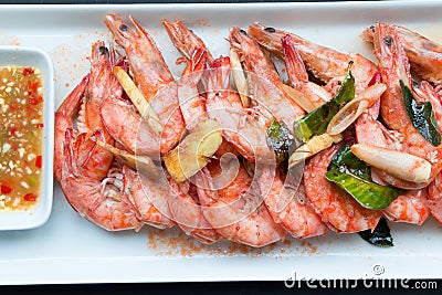 Casseroled prawns with Thai herbs eat Stock Photo