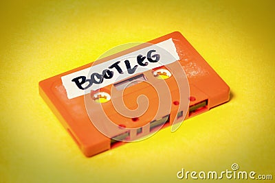 Cassette tape orange on yellow bootleg Stock Photo