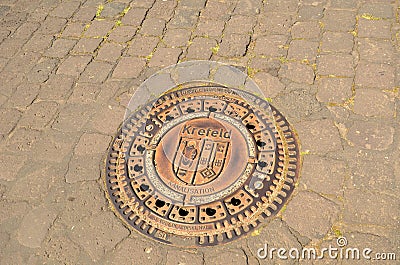 Cast-iron manhole covers Editorial Stock Photo