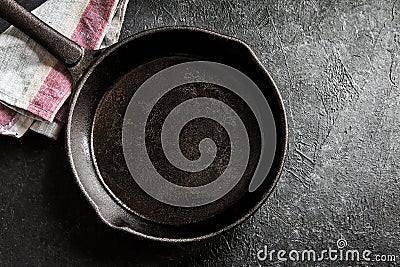 Cast iron pan on black Stock Photo