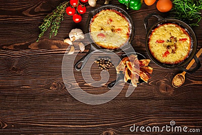 Cast-iron pan and spices, view from above Stock Photo