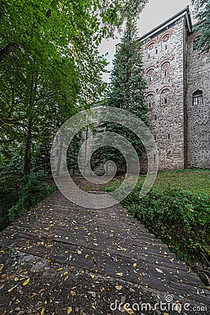 Castel monastery wall windows bridge green Stock Photo