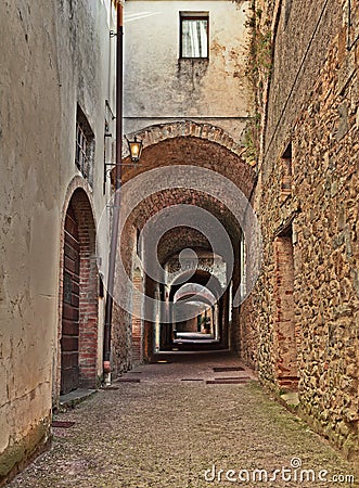 Castellina in Chianti, Siena, Tuscany, Italy: the ancient street Via delle Volte Stock Photo