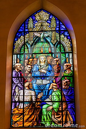 Adoration of Virgin Mary on stained glass window inside the cathedral of Castellon de la Plana, Spain Editorial Stock Photo